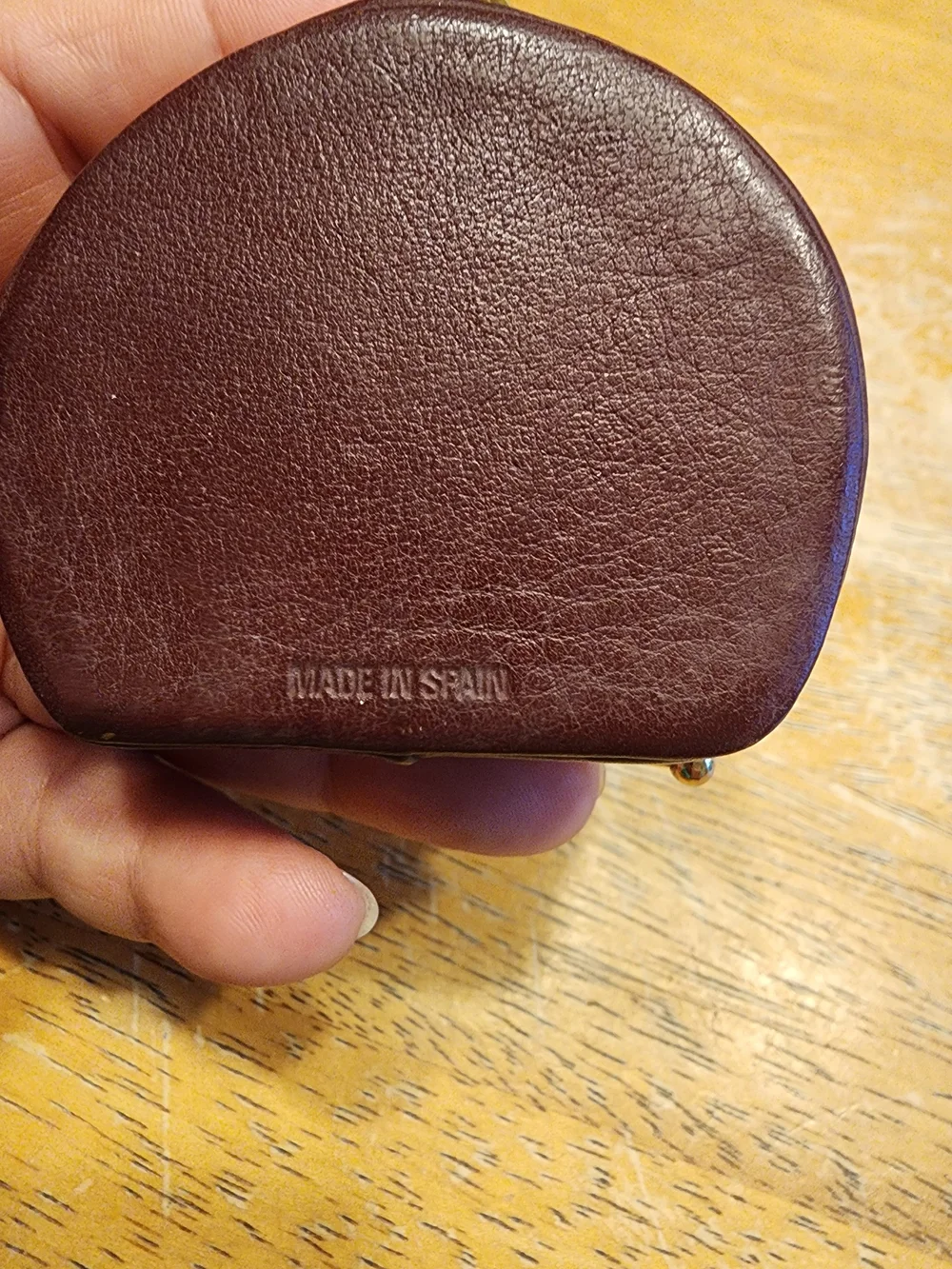vintage Christian Dior maroon leather kiss-lock coin purse embossed Logo
